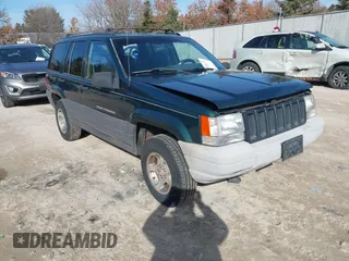 1997 Jeep Grand Cherokee Laredo with VIN 1J4GZ58S2VC595442, listed as a IAAI auction lot 41772133 with 229,764 mi miles. Bid and sale history available at carsss.com. Image 1.