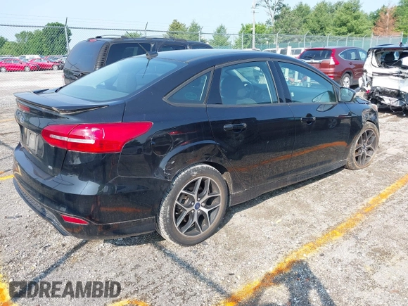 2016 Ford Focus SE with VIN 1FADP3F25GL258603, listed as a IAAI auction lot 42450289 with 73,453 mi miles and . Bid and sale history available at DreamBid. Image 4.