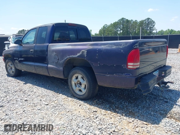 1998 Dodge Dakota SLT with VIN 1B7GL22X3WS569885, listed as a IAAI auction lot 42128994 with 1 mi miles. Bid and sale history available at carsss.com. Image 3.
