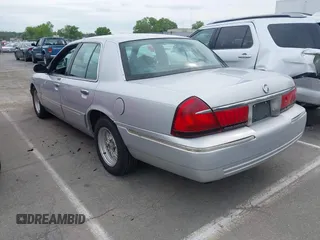 2001 Mercury Grand Marquis LS z VIN 2MEFM75W91X655747, wystawiony jako IAAI lot #42041090 z przebiegiem 138 906 mil mil oraz . Historia ofert i sprzedaży dostępna na DreamBid. Obrazek 3.