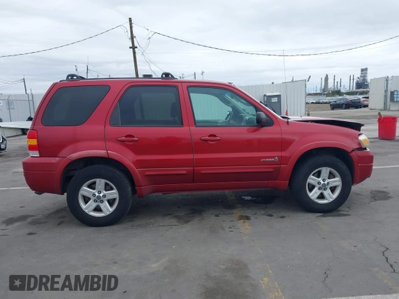 2006 Ford Escape Hybrid with VIN 1FMCU96H96KA52738, listed as a IAAI auction lot 41773608 with 214,834 mi miles and . Bid and sale history available at DreamBid. Image 13.
