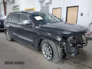 2013 Jeep Grand Cherokee Overland with VIN 1C4RJFCT7DC524005, listed as a IAAI auction lot 42116097 with 126,942 mi miles. Bid and sale history available at carsss.com. Image 1.