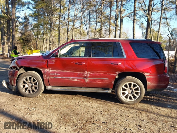 2019 GMC Yukon Denali with VIN 1GKS2CKJ8KR137636, listed as a IAAI auction lot 41264171 with 153,136 mi miles. Bid and sale history available at carsss.com. Image 14.