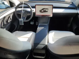 2023 Tesla Model Y Long Range z VIN 7SAYGAEE2PF758235, wystawiony jako Copart lot #49059895 z przebiegiem 57 615 mil mil oraz Czysty tytuł • Clean title. Historia ofert i sprzedaży dostępna na DreamBid. Obrazek 8.