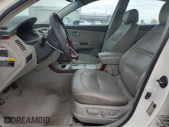 2006 Hyundai Azera SE z VIN KMHFC46F26A046383, wystawiony jako Copart lot #47971535 z przebiegiem 306 323 mil mil oraz Szkoda całkowita • Salvage title. Historia ofert i sprzedaży dostępna na DreamBid. Obrazek 7.