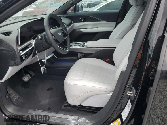 2024 Cadillac LYRIQ Sport z VIN 1GYKPTRK4RZ108926, wystawiony jako Copart lot #52029685 z przebiegiem 10 284 mil mil oraz Szkoda całkowita • Salvage title. Historia ofert i sprzedaży dostępna na DreamBid. Obrazek 7.
