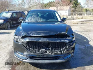 2017 Mazda CX-5 Sport with VIN JM3KFABL5H0141895, listed as a IAAI auction lot 41718108 with 69,312 mi miles. Bid and sale history available at carsss.com. Image 12.