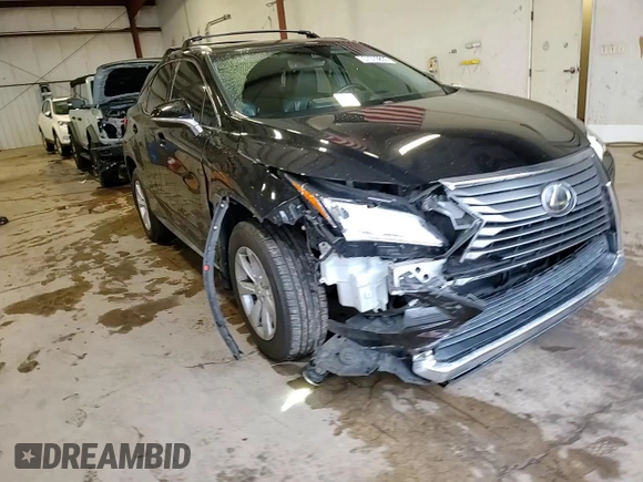 2016 Lexus RX 350 with VIN 2T2BZMCA3GC001679, listed as a Copart auction lot 57070835 with 74,729 mi miles and Salvage Title. Bid and sale history available at DreamBid. Image 14.