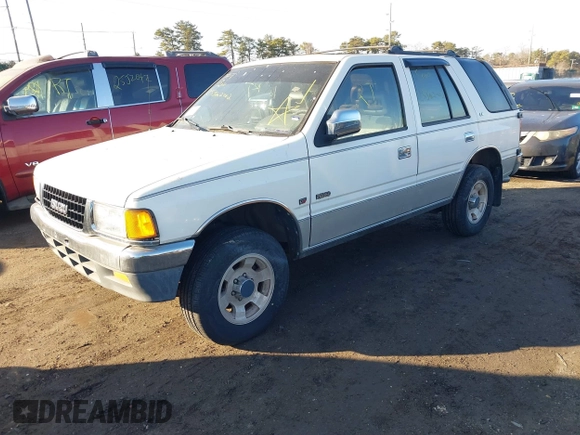 1994 Isuzu Rodeo LS z VIN 4S2CG58V5R4332970, wystawiony jako IAAI lot #41680075 z przebiegiem 182 330 mil mil oraz . Historia ofert i sprzedaży dostępna na DreamBid. Obrazek 2.