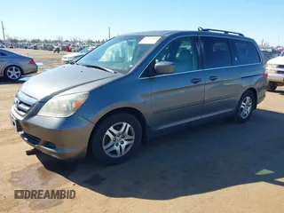 2007 Honda Odyssey EX-L z VIN 5FNRL386X7B405321, wystawiony jako IAAI lot #41703384 z przebiegiem 198 552 mil mil oraz . Historia ofert i sprzedaży dostępna na DreamBid. Obrazek 2.