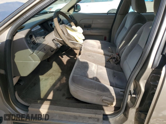 2003 Ford Police Interceptor Street Appear with VIN 2FAFP71W73X148322, listed as a Copart auction lot 55573035 with 268,812 mi miles and Salvage title. Bid and sale history available at DreamBid. Image 7.
