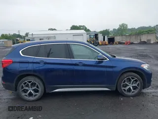 2018 BMW X1 xDrive28i with VIN WBXHT3C32J5L33213, listed as a IAAI auction lot 42513235 with 75,918 mi miles and . Bid and sale history available at DreamBid. Image 13.