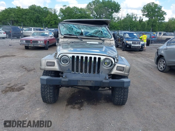 2004 Jeep Wrangler Sahara with VIN 1J4FA59S54P740417, listed as a IAAI auction lot 42382078 with 200,108 mi miles and . Bid and sale history available at DreamBid. Image 13.