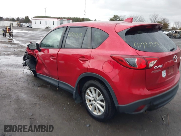 2014 Mazda CX-5 Touring with VIN JM3KE2CY2E0322211, listed as a IAAI auction lot 41721219 with 127,312 mi miles. Bid and sale history available at carsss.com. Image 3.