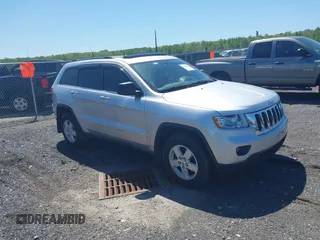 2011 Jeep Grand Cherokee 70th Anniversary with VIN 1J4RR4GG8BC515170, listed as a IAAI auction lot 42135654 with 208,638 mi miles. Bid and sale history available at carsss.com. Image 1.