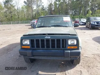 1998 Jeep Cherokee Sport with VIN 1J4FT68S8WL131348, listed as a IAAI auction lot 41912540 with 111,579 mi miles. Bid and sale history available at carsss.com. Image 6.
