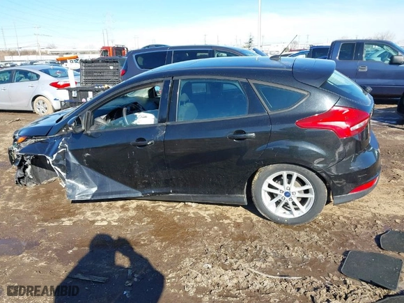 2015 Ford Focus SE with VIN 1FADP3K26FL289461, listed as a IAAI auction lot 41579565 with 148,738 mi miles. Bid and sale history available at carsss.com. Image 15.