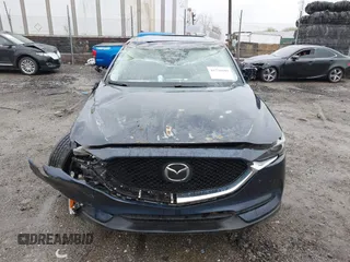 2019 Mazda CX-5 Grand Touring with VIN JM3KFBDM6K0592496, listed as a IAAI auction lot 41730103 with Not Provided miles and . Bid and sale history available at carsss.com. Image 11.