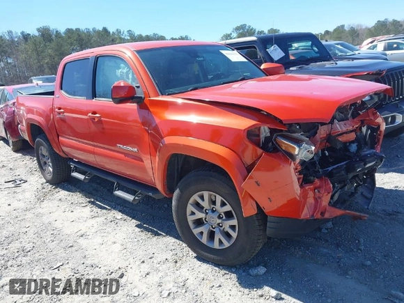 2018 Toyota Tacoma SR5 with VIN 5TFAZ5CN5JX066115, listed as a IAAI auction lot 41816133 with 70,283 mi miles and . Bid and sale history available at DreamBid. Image 1.