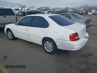1999 Nissan Altima XE with VIN 1N4DL01DXXC189667, listed as a IAAI auction lot 41715276 with 132,425 mi miles. Bid and sale history available at carsss.com. Image 3.
