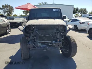 2013 Jeep Wrangler Unlimited Rubicon 10th Anniversary with VIN 1C4HJWFG4DL550832, listed as a Copart auction lot 71633684 with 60,759 mi miles and Salvage title. Bid and sale history available at DreamBid. Image 5.