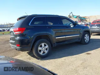 2012 Jeep Grand Cherokee Laredo with VIN 1C4RJFAG5CC118826, listed as a IAAI auction lot 42039801 with 158,153 mi miles. Bid and sale history available at carsss.com. Image 4.
