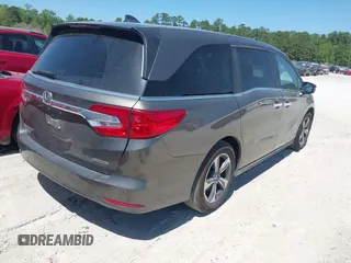 2020 Honda Odyssey Touring with VIN 5FNRL6H87LB002202, listed as a IAAI auction lot 42015741 with 182,051 mi miles and . Bid and sale history available at DreamBid. Image 4.