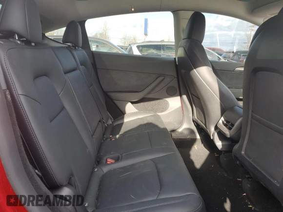 2024 Tesla Model Y Long Range z VIN 7SAYGDEE8RA302077, wystawiony jako Copart lot #52622465 z przebiegiem 11 830 mil mil oraz Szkoda całkowita • Salvage title. Historia ofert i sprzedaży dostępna na DreamBid. Obrazek 11.