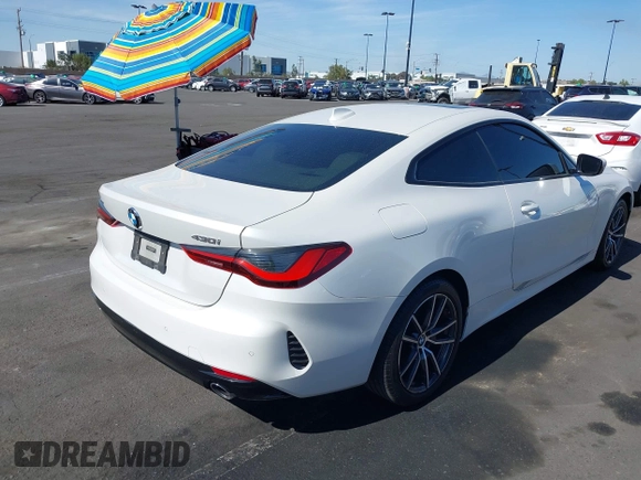 2022 BMW 4 Series 430i xDrive with VIN WBA73AP03NCH61029, listed as a IAAI auction lot 42327779 with 104,860 mi miles and . Bid and sale history available at DreamBid. Image 4.