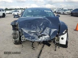 2024 Tesla Model 3 with VIN 5YJ3E1EA5RF741345, listed as a Copart auction lot 51535165 with 7,372 mi miles and Salvage Title. Bid and sale history available at DreamBid. Image 5.