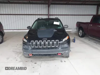 2014 Jeep Cherokee Trailhawk with VIN 1C4PJMBS3EW150366, listed as a IAAI auction lot 41971035 with 90,994 mi miles. Bid and sale history available at carsss.com. Image 11.