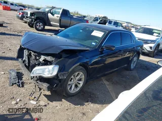 2016 Chrysler 300 Anniversary Edition with VIN 2C3CCAAGXGH261376, listed as a IAAI auction lot 41833894 with 64,489 mi miles and . Bid and sale history available at DreamBid. Image 18.