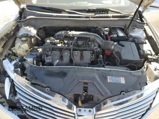 2015 Lincoln MKZ z VIN 3LN6L2G9XFR610736, wystawiony jako Copart lot #80662274 z przebiegiem 101 441 mil mil oraz Szkoda całkowita • Salvage title. Historia ofert i sprzedaży dostępna na DreamBid. Obrazek 12.