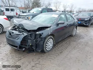2008 Toyota Camry LE with VIN 4T1BK46K68U067348, listed as a IAAI auction lot 41469784 with 154,513 mi miles. Bid and sale history available at carsss.com. Image 2.