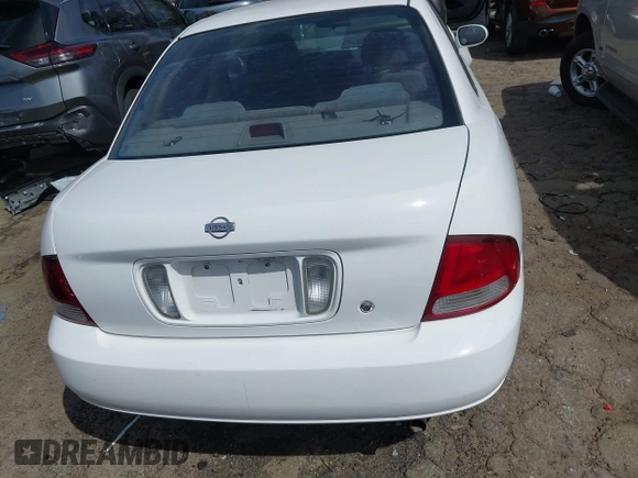 2002 Nissan Sentra GXE z VIN 3N1CB51D12L649594, wystawiony jako IAAI lot #41758242 z przebiegiem 274 883 mil mil oraz . Historia ofert i sprzedaży dostępna na DreamBid. Obrazek 16.
