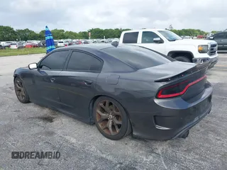 2019 Dodge Charger GT with VIN 2C3CDXHG6KH628451, listed as a IAAI auction lot 40750593 with 80,996 mi miles and . Bid and sale history available at DreamBid. Image 3.