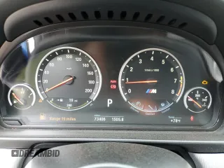 2014 BMW M5 z VIN WBSFV9C5XED097563, wystawiony jako Copart lot #72175354 z przebiegiem 73 406 mil mil oraz Szkody całkowita. Historia ofert i sprzedaży dostępna na DreamBid. Obrazek 9.