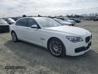2015 BMW 7 Series 750Li z VIN WBAYE8C52FD781791, wystawiony jako Copart lot #49504935 z przebiegiem 103 171 mil mil oraz Szkoda całkowita • Salvage title. Historia ofert i sprzedaży dostępna na DreamBid. Obrazek 4.
