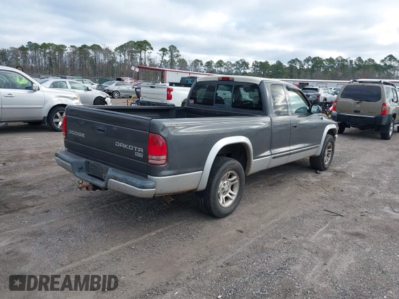 2003 Dodge Dakota SLT with VIN 1D7HL42N63S100130, listed as a IAAI auction lot 41419945 with 185,326 mi miles. Bid and sale history available at carsss.com. Image 4.