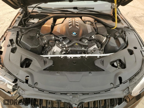 2022 BMW 8 Series M850i with VIN WBAGV8C02NCK08667, listed as a Copart auction lot 88255605 with 22,737 mi miles and Salvage title. Bid and sale history available at DreamBid. Image 11.