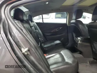 2013 Buick LaCrosse Touring with VIN 1G4GJ5G38DF182344, listed as a Copart auction lot 52602055 with 153,759 mi miles and Salvage title. Bid and sale history available at DreamBid. Image 10.