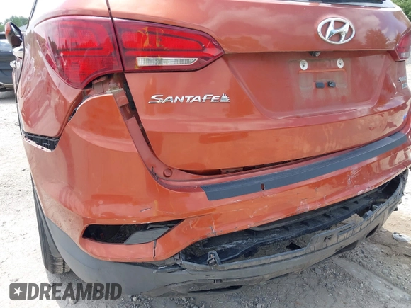 2017 Hyundai Santa Fe 2.4L z VIN 5XYZUDLB1HG463416, wystawiony jako IAAI lot #42546637 z przebiegiem 81 963 mil mil oraz . Historia ofert i sprzedaży dostępna na DreamBid. Obrazek 6.