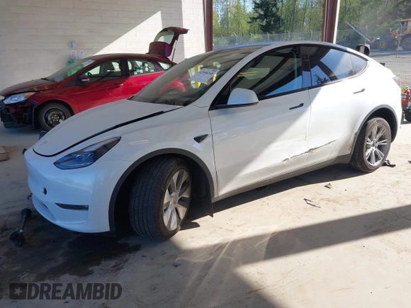2024 Tesla Model Y Long Range with VIN 7SAYGAEEXRF988561, listed as a IAAI auction lot 42058248 with 7,845 mi miles. Bid and sale history available at carsss.com. Image 17.