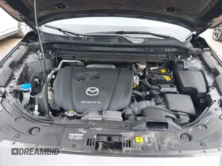 2020 Mazda CX-5 Touring with VIN JM3KFBCM2L0850855, listed as a IAAI auction lot 42147339 with 75,955 mi miles and . Bid and sale history available at carsss.com. Image 10.