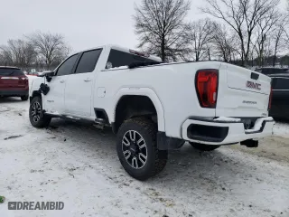 2021 GMC Sierra 2500HD AT4 with VIN 1GT49PEY4MF112141, listed as a Copart auction lot 88981925 with 95,803 mi miles and Salvage Title. Bid and sale history available at carsss.com. Image 2.