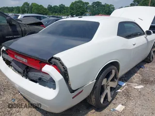 2012 Dodge Challenger SXT Plus z VIN 2C3CDYAG3CH168263, wystawiony jako IAAI lot #42283885 z przebiegiem 200 052 mil mil oraz . Historia ofert i sprzedaży dostępna na DreamBid. Obrazek 4.