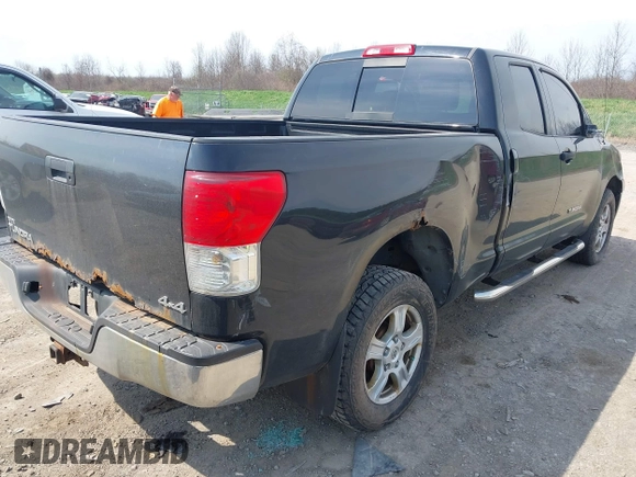 2010 Toyota Tundra 4WD Truck with VIN 5TFUM5F14AX015516, listed as a IAAI auction lot 42118639 with 204,489 mi miles. Bid and sale history available at carsss.com. Image 4.