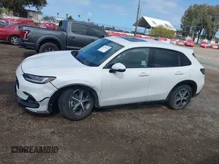2025 Honda HR-V EX-L z VIN 3CZRZ1H78SM738630, wystawiony jako IAAI lot #41944020 z przebiegiem 4006 mil mil oraz . Historia ofert i sprzedaży dostępna na DreamBid. Obrazek 14.