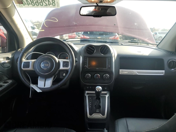 2016 Jeep Compass Latitude with VIN 1C4NJCEB7GD543444, listed as a Copart auction lot 84266844 with 61,564 mi miles and Salvage Title. Bid and sale history available at carsss.com. Image 8.