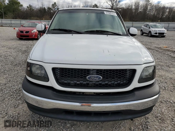 2002 Ford F-150 XL with VIN 1FTRX17W12NA96391, listed as a Copart auction lot 87000064 with 199,867 mi miles and Salvage Title. Bid and sale history available at carsss.com. Image 5.
